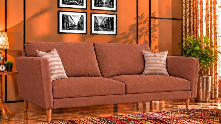 Maurice SR 13 on a sofa